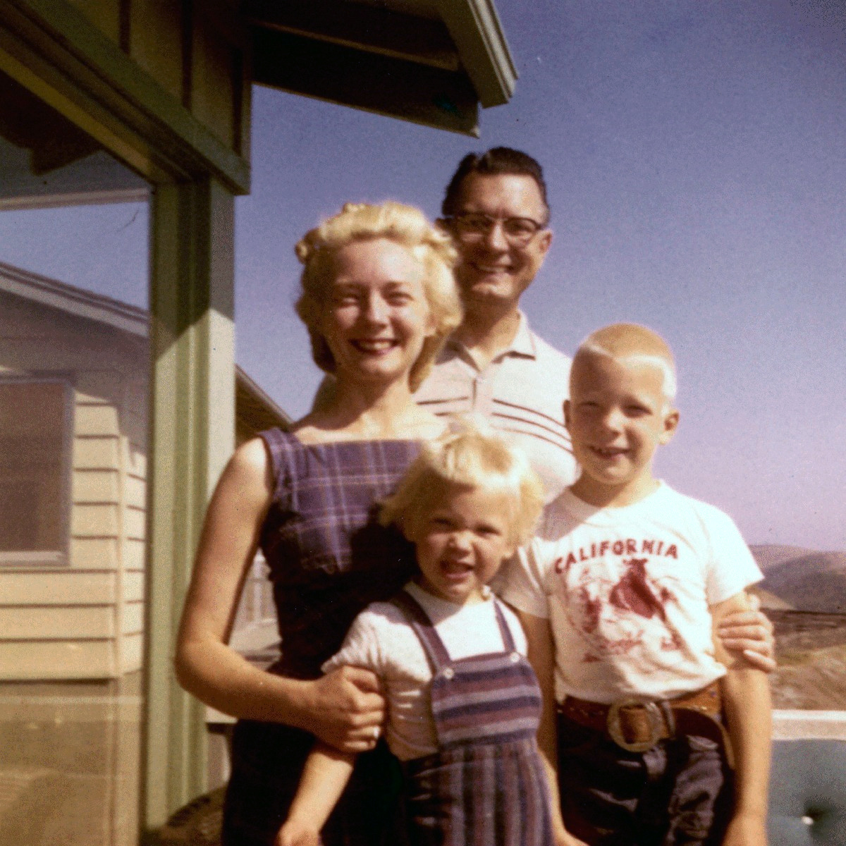 Parents, son and daughter from the 50s era.