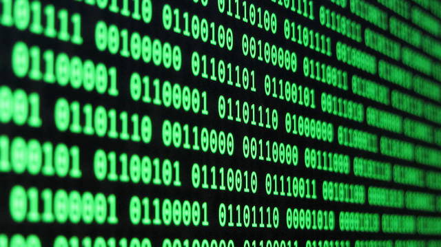 Binary code, green on black background.