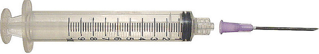 A hypodermic needle.