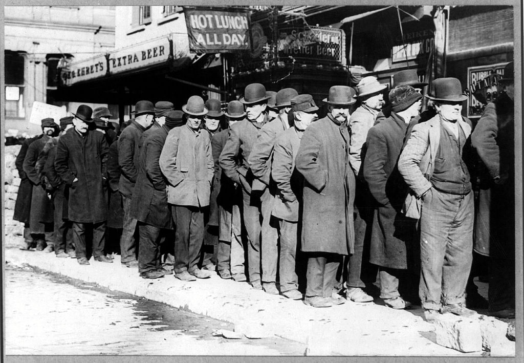 People standing close together in a line.
